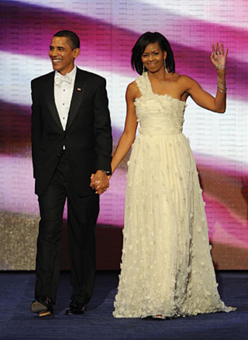 galleries/2009/11/25/a-pictorial-ode-to-michelle-obama/crouch-michelle-obama-7_hkn2pt