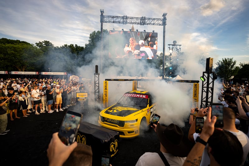 A Dodge RAM race car performs a burnout during the UFC Freedom 250 Fan Fest on The Ellipse ahead of the upcoming UFC Freedom 250 fight on the South Lawn of the White House on June 13.