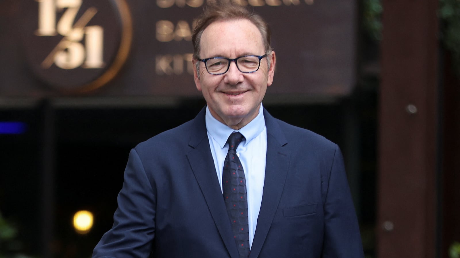 Elton John and David Furnish testified at the sexual assault trial of Kevin Spacey.