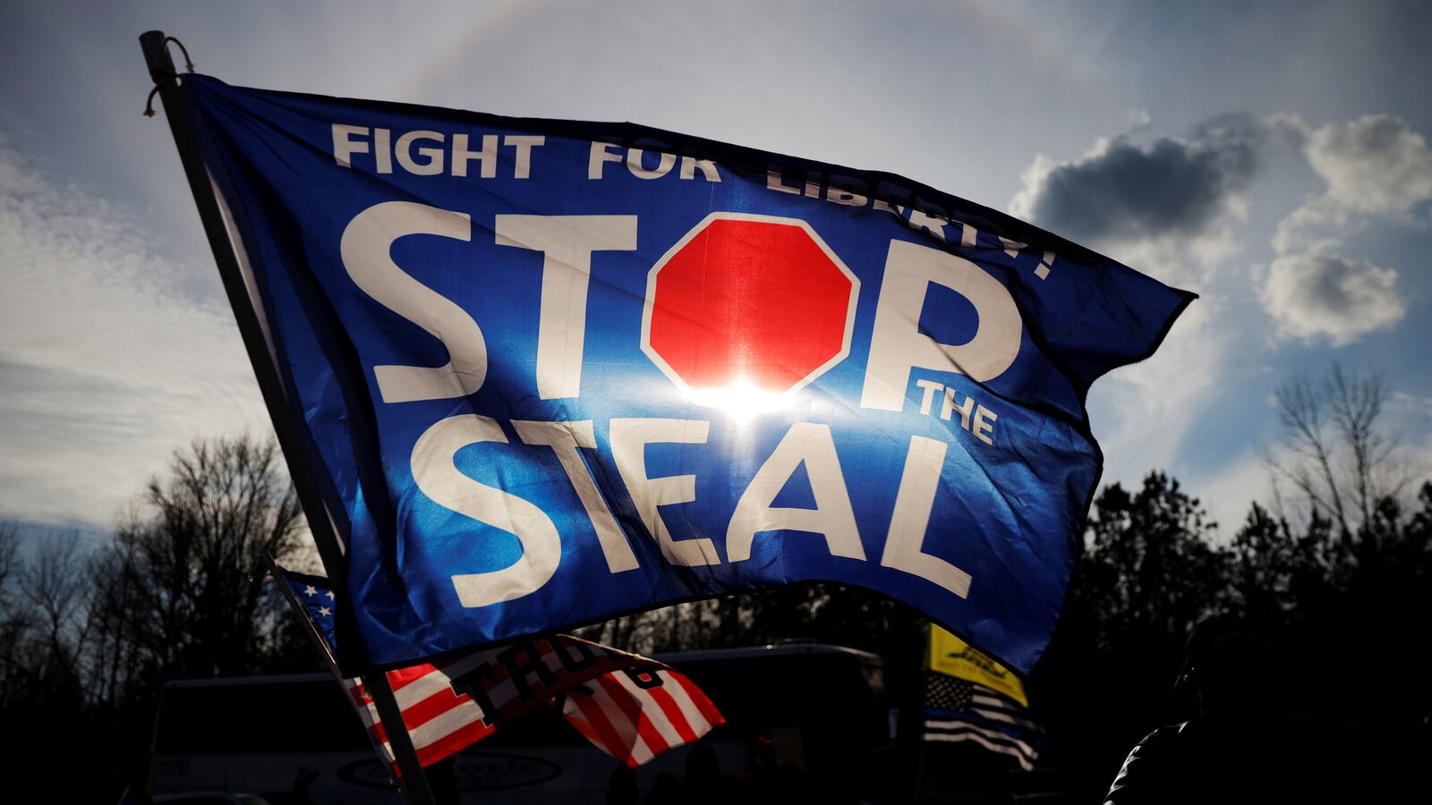 2021-01-04T221310Z_1606789092_RC2A1L9HG80O_RTRMADP_3_USA-ELECTION-GEORGIA-TRUMP_p048jl