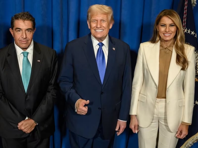 The Zampolis pose with Donald and Melania Trump