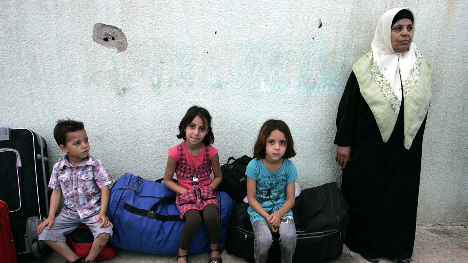 articles/2011/06/26/gaza-rafah-border-no-goods-few-people-cross-to-egypt-a-month-after-opening/egypt-gaza-border-ephron_ouewdx