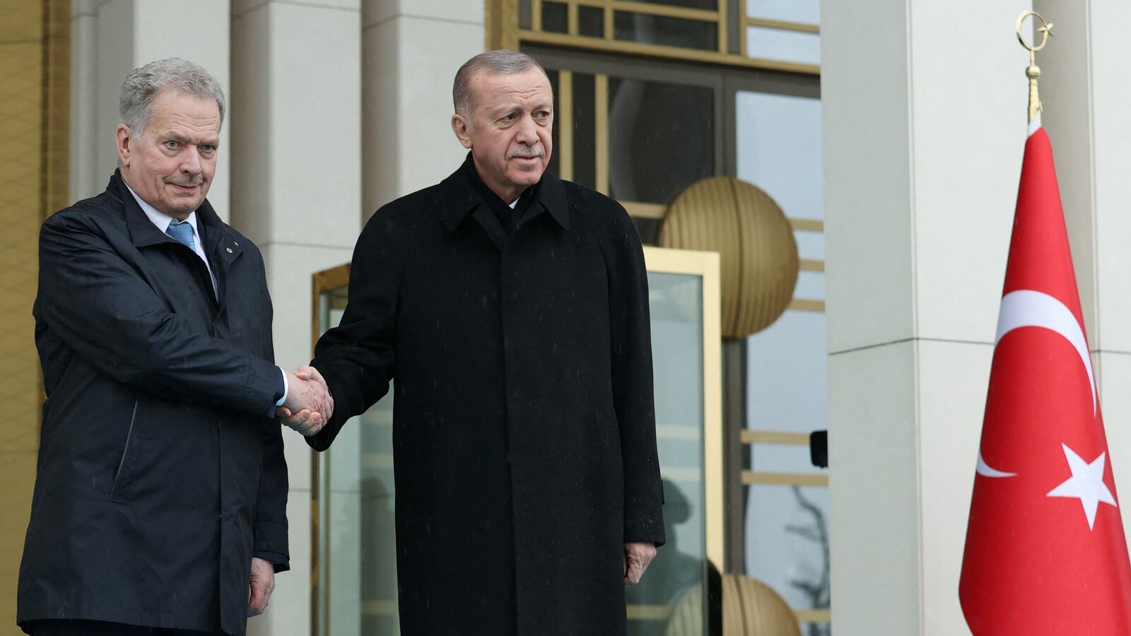 Turkey's President Tayyip Erdogan and Finland's President Sauli Niinisto shake hands during a welcoming ceremony in Ankara, Turkey March 17, 2023.
