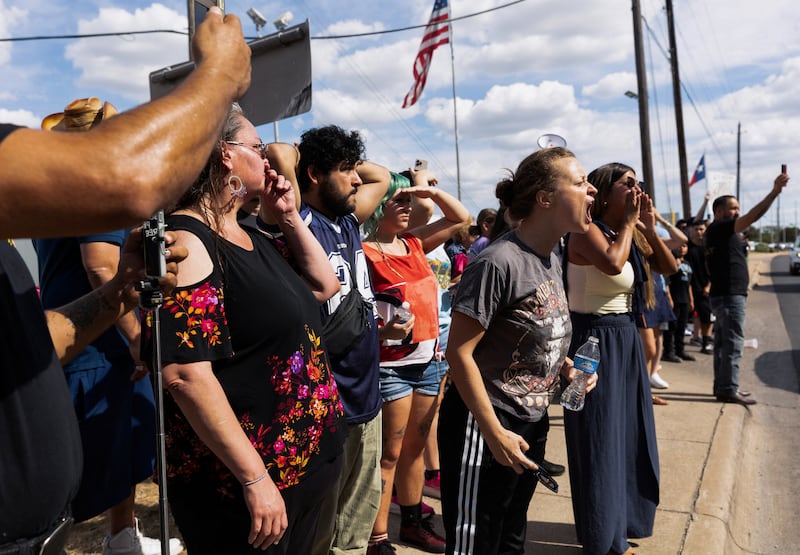 Protesters confront police officers (not picured) after city officials said that a U.S. Immigration and Customs Enforcement (ICE) agent shot a person earlier in the day in Austin, Texas, U.S. September 20, 2026.   REUTERS/Nuri Vallbona
