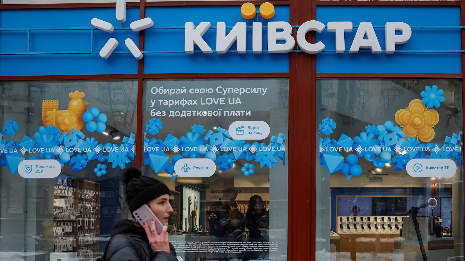 A woman walks past a store of Ukraine's telecommunications company Kyivstar, amid Russia's attack on Ukraine