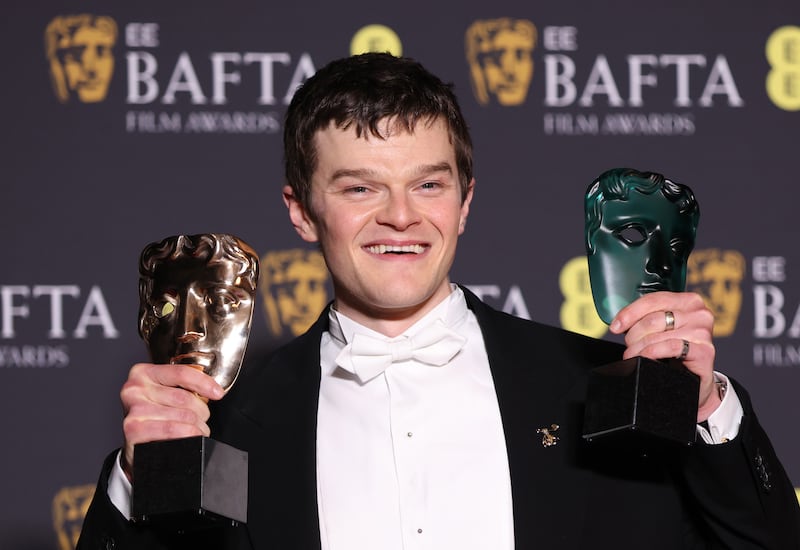 Robert Aramayo with the Leading Actor Award for 'I Swear' and the EE Rising Star Award in the winners room during the 2026 EE BAFTA Film Awards at The Royal Festival Hall on February 22, 2026 in London, England.