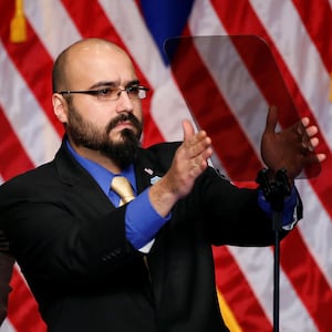 Gabriel Perez adjusts the teleprompter before President Donald Trump delivers remarks regarding the Administration's National Security Strategy at the Ronald Reagan Building and International Trade Center in Washington D.C on December 18, 2017.
