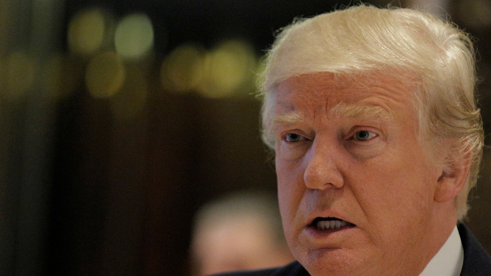 U.S. President-elect Donald Trump speaks to members of the press at Trump Tower in Manhattan, New York City, U.S.