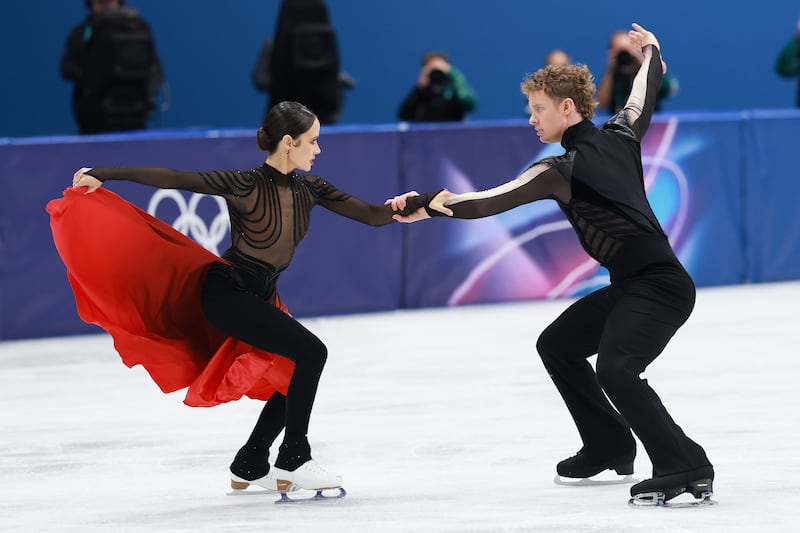Madison Chock and Evan Bates of Team United States compete in the Figure Skating Ice Dance
