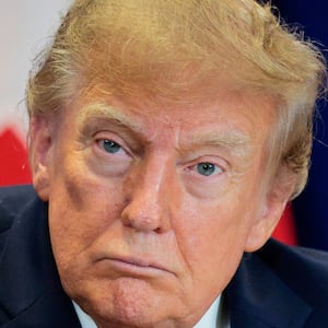 NEW YORK, NEW YORK - SEPTEMBER 22: U.S. President Donald Trump looks on during the signing of a security pact between the U.S., Denmark, and Greenland during the 81st session of the United Nations (U.N.) General Assembly at U.N. Headquarters on September 22, 2026 in New York City. World leaders have gathered in New York for the annual session of the United Nations General Assembly, with this year's global issues ranging from the threat of artificial intelligence to the continued wars in Ukraine and Gaza. (Photo by Chip Somodevilla/Getty Images)