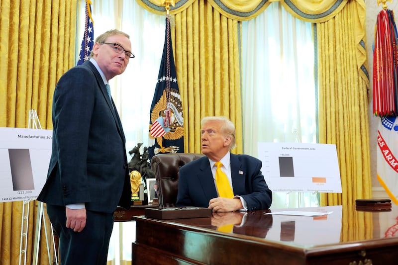 President Donald Trump speaks with Director of the National Economic Council Kevin Hassett in the Oval Office at the White House on March 07, 2025 in Washington, DC.