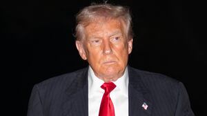 US President Donald Trump arrives to the White House in Washington, DC, following a trip to Palm Beach, Florida with a stop at a Washington Commanders football game on November 9, 2025.