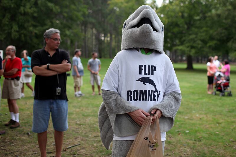 articles/2011/12/20/republicans-dissatisfied-with-their-presidential-field-dream-of-deadlock/romney-protester-medved_uzwmlz