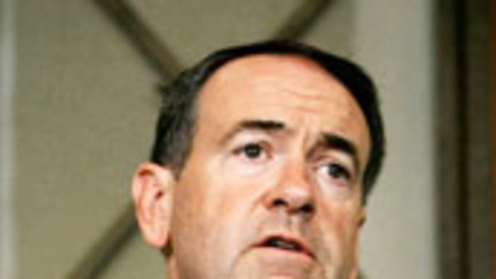 articles/2009/12/02/another-one-bites-the-dust/mckinnon-huckabee_66698_sjjonu