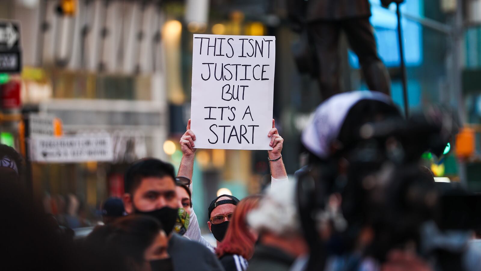 A photo of BLM protesters gathered at Times Square after the jury found former police officer Derek Chauvin guilty in the death of George Floyd.