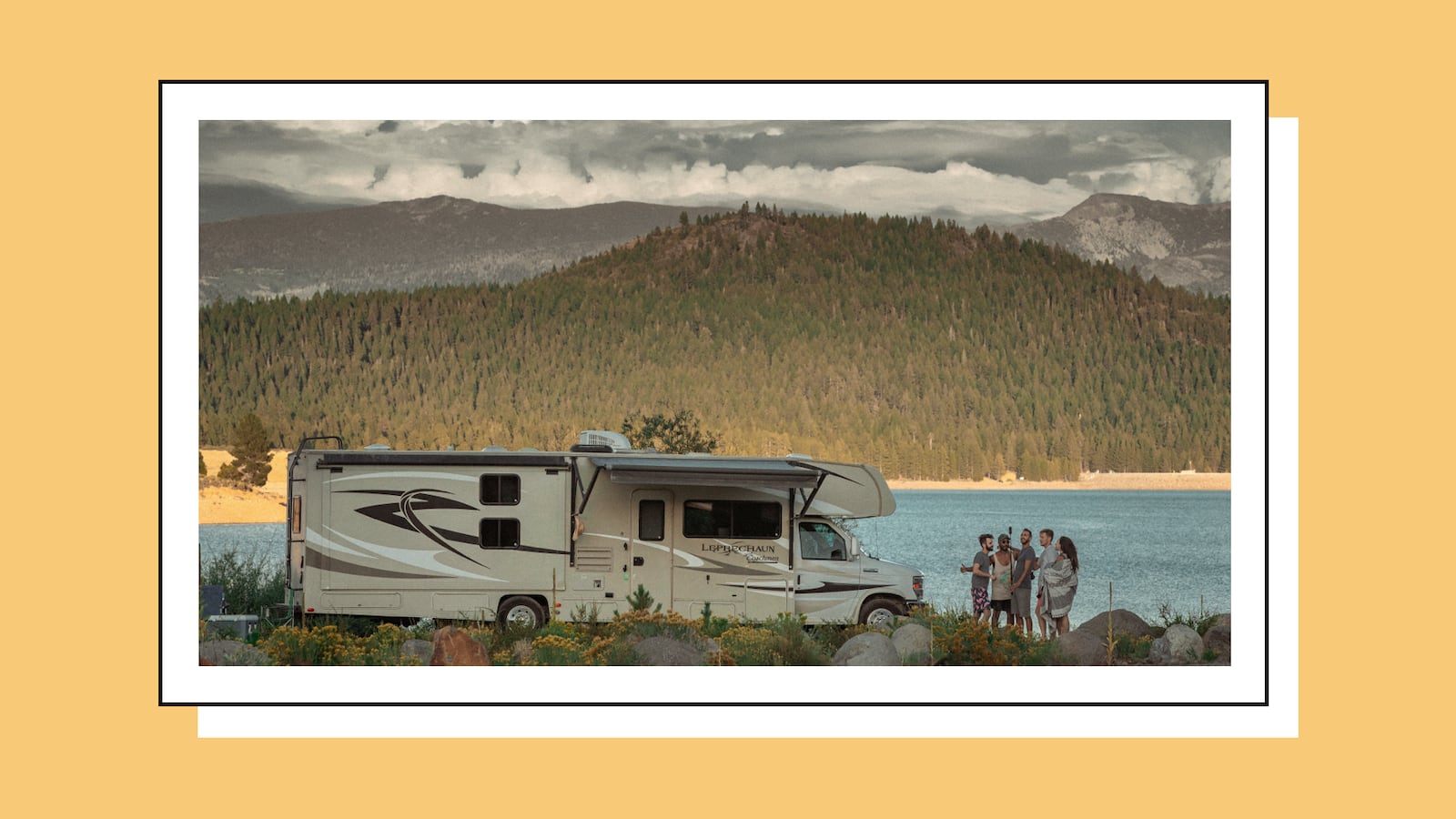 People taking a selfie near their rented RV