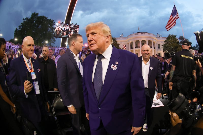 Jun 14, 2026; Washington, D.C., UNITED STATES; U.S. President Donald Trump and UFC President and CEO Dana White walk out during UFC Freedom 250 at White House South Lawn. Mandatory Credit: Amber Searls-Imagn Images