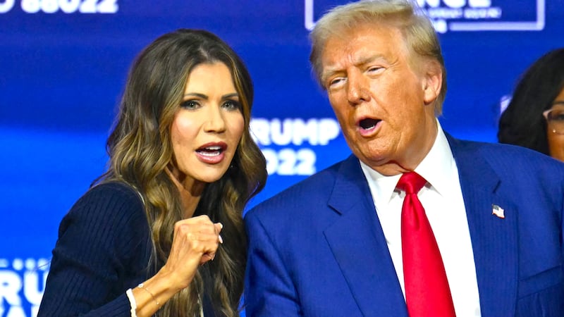 Donald Trump and Kristi Noem during a town hall at the Greater Philadelphia Expo Center and Fairgrounds in Oaks, Pennsylvania, on October 14, 2024.