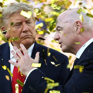 Soccer Football - FIFA World Cup 2026 - Final - Spain v Argentina - New York/New Jersey Stadium, East Rutherford, New Jersey, U.S. - July 19, 2026 U.S. President Donald Trump and FIFA President Gianni Infantino during the trophy presentation after the match IMAGN IMAGES via Reuters/Mark J Rebilas