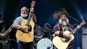 Kyle Gass, Jack Black, and bassist John Spiker of Tenacious D perform at PNC Music Pavilion on Sept. 6, 2023, in Charlotte, North Carolina.