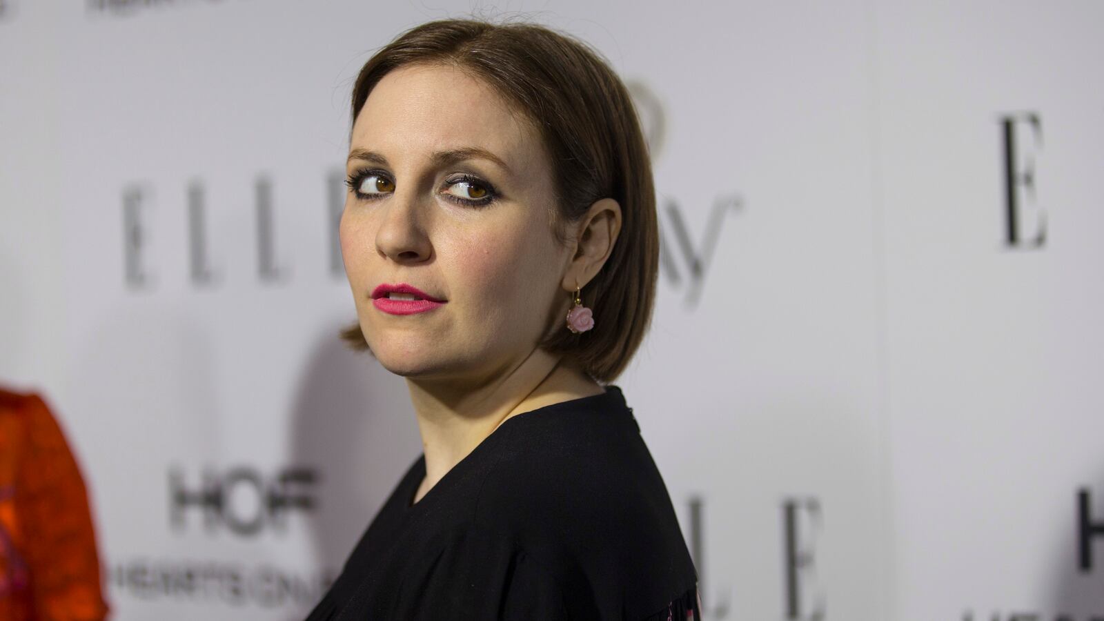 Actress Lena Dunham poses at Elle Magazine annual Women in Television dinner in Los Angeles