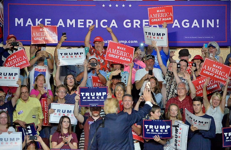 ROANOKE, VA - SEPTEMBER 24: Republican presidential nominee Donald Trump waves to supporters during a campaign event at the Berglund Center on September 24, 2016 in Roanoke, Virginia. Trump spoke about lowering taxes and encouraging job growth during his last speech ahead of the first presidential debate with Democratic Presidential nominee Hillary Clinton on September 26. (Photo by Sara D. Davis/Getty Images)