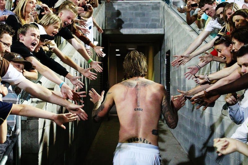galleries/2013/05/16/let-us-reflect-on-david-beckham-s-hotness/130513-beckham-back-fans_ebuugb