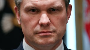 Defense Secretary Pete Hegseth looks on during a cabinet meeting in the Cabinet Room of the White House on March 26, 2026.