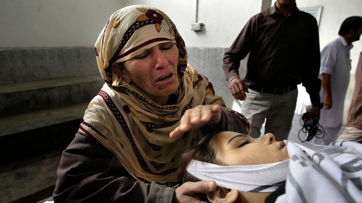 articles/2012/12/19/pakistan-mullahs-and-militants-keep-polio-alive/sami-polio-workers-killed-tease-embed_jjgxbv