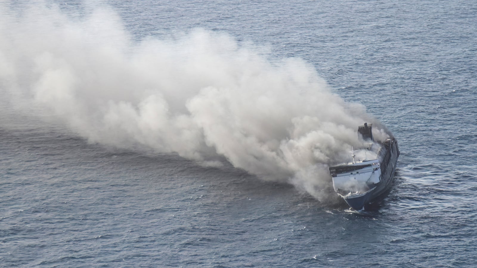 This aerial picture shows the passenger ship Mutiara Sentosa 2 catching fire in the waters off Madura island, East Java, on August 2, 2026. Five people have been found dead, 41 are missing and 225 were rescued after an Indonesian ferry caught fire while at sea on August 2, search and rescue officials said.