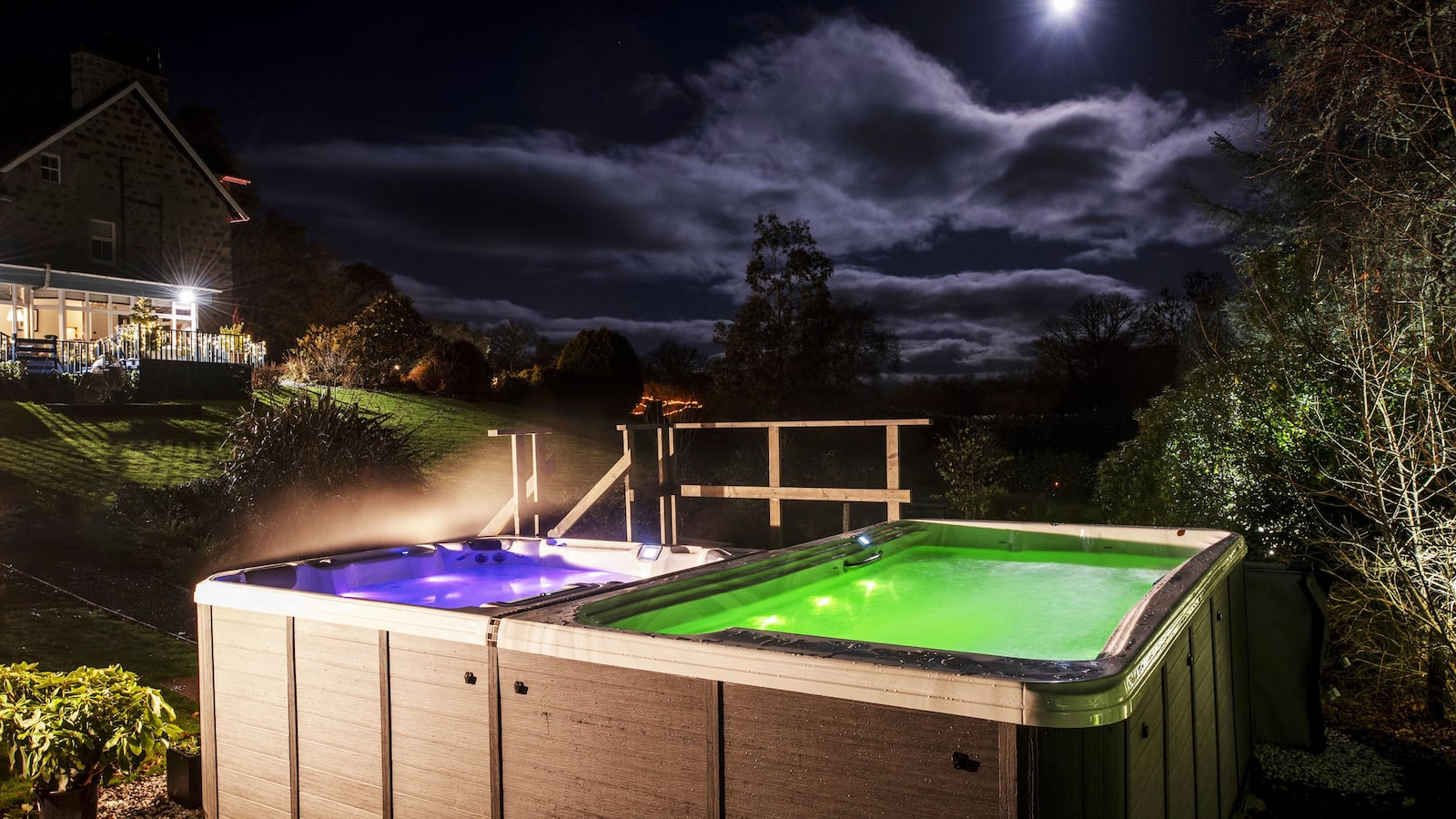 A photo including a hot tub and dark skies