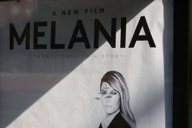 A view of a defaced bus stop advertisement for the new documentary film about First Lady Melania Trump at Exposition Park in Los Angeles