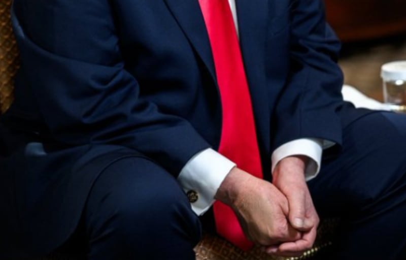 Close-up of Trump's make-up covered hand at the White House.