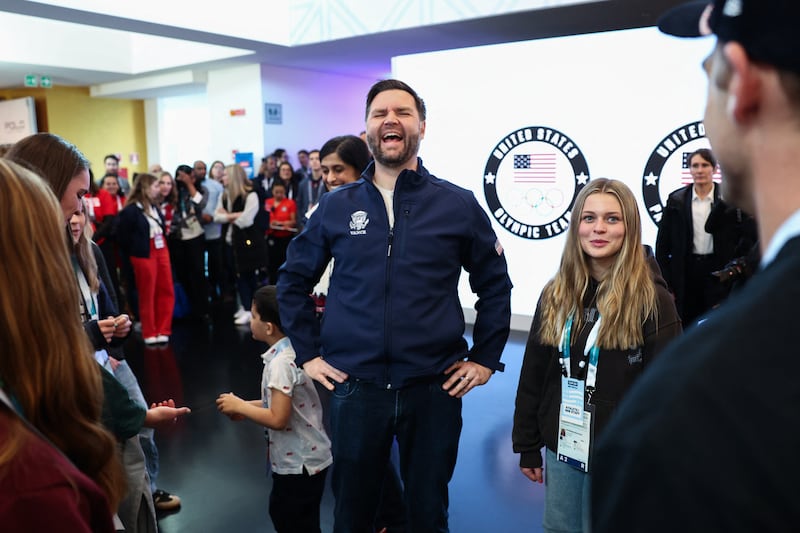US Vice President JD Vance (C) reacts at the Team USA Welcome Experience ahead of the Milano Cortina 2026 Winter Olympic Games.