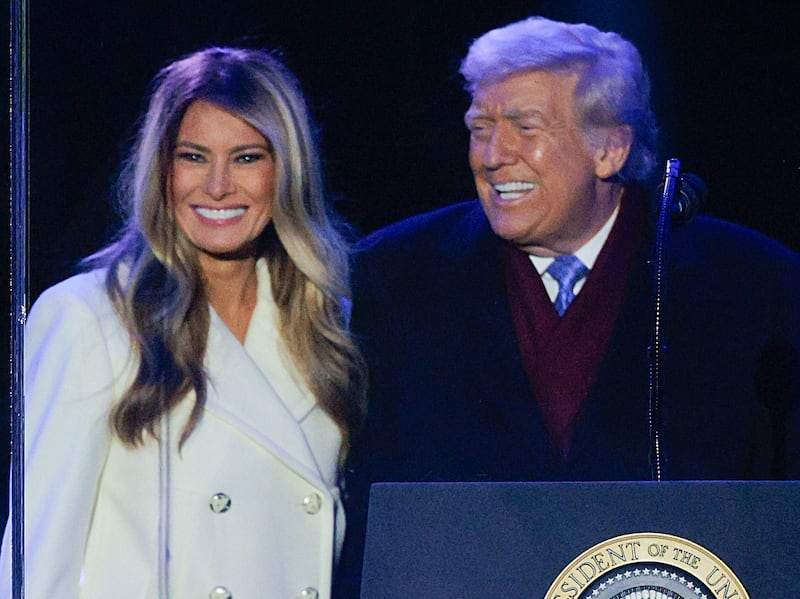 WASHINGTON, DC - DECEMBER 04: U.S. President Donald Trump and first lady Melania Trump participate in the 103rd National Christmas Tree Lighting Ceremony at the White House Ellipse on December 04, 2025 in Washington, DC. The tree is a 32-foot-tall red spruce from the George Washington and Jefferson National Forests in Virginia's Highland County. This is the second year in a row that the George Washington and Jefferson National Forests have provided the tree. (Photo by Chip Somodevilla/Getty Images)