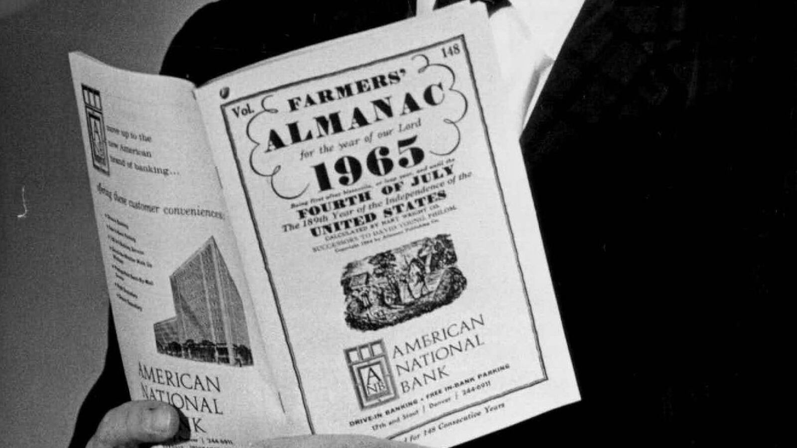 Ray Geiger; He holds 1965 almanac.; Publishers of the Farmers' Almanac
