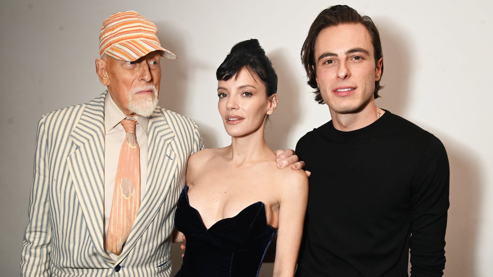 Antony Price, Lily Allen and Marco Capaldo pose backstage at the 16Arlington x Antony Price Salon Show on November 17, 2025 in London, England.
