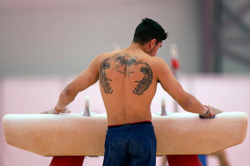 galleries/2012/07/30/ryan-lochte-anastasia-davydova-more-olympians-tattoos-photos/olympic-tattoos-smith_lhtfok