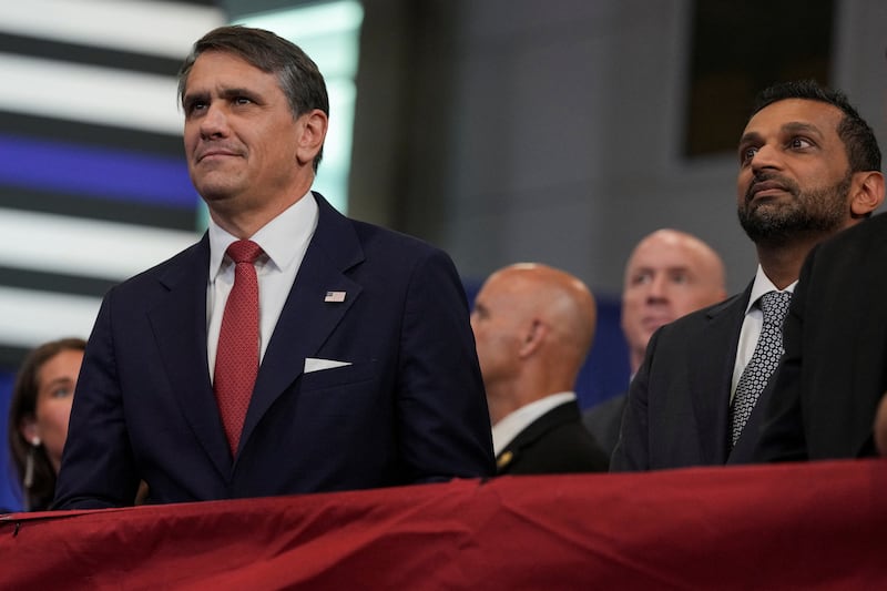 U.S. Attorney General Todd Blanche and FBI Director Kash Patel listen to the President Donald Trump's remarks in New York.