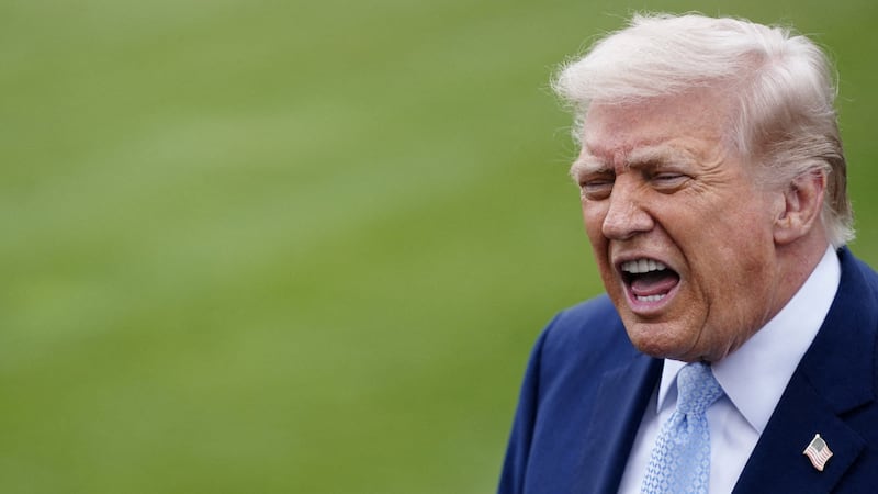 President Donald Trump speaks to the media as he departs the White House for Florida, in Washington, D.C., U.S., March 20, 2026.
