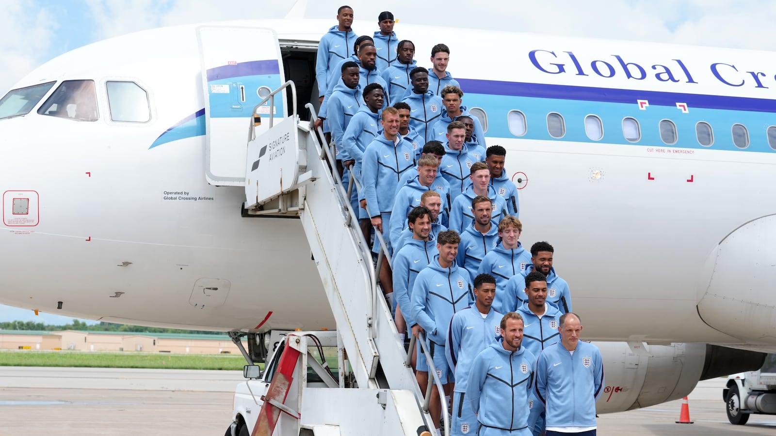 Members of England national team pose for a team photo after arriving at Charles B. Wheeler Downtown Airport on June 13, 2026 in Kansas City, Missouri.