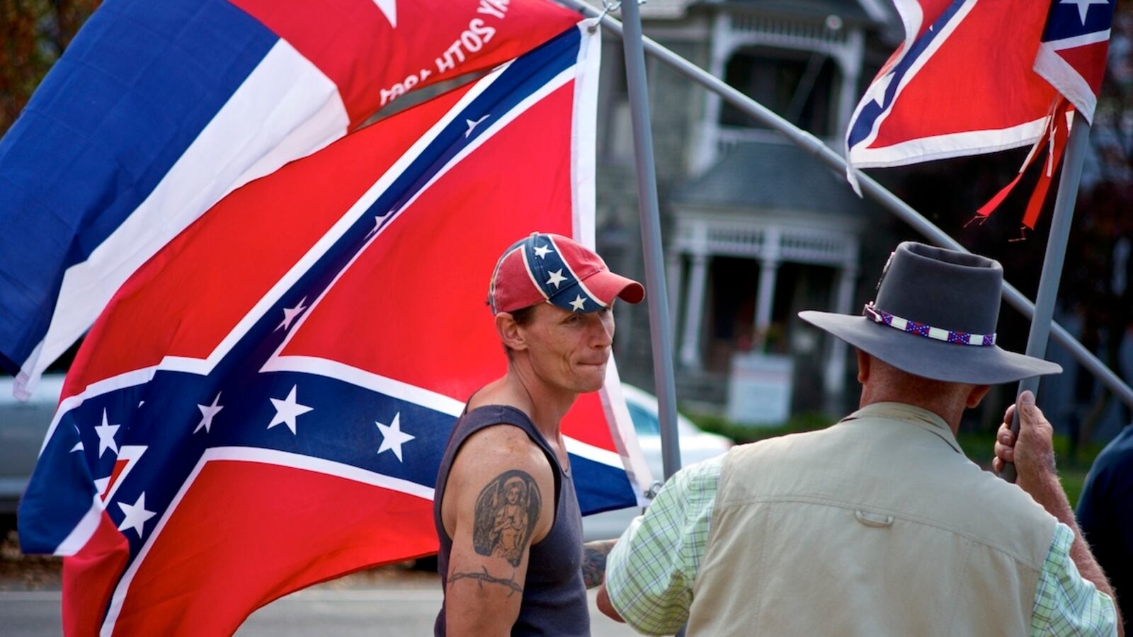 articles/2013/11/02/pro-confederate-protesters-in-richmond-rally-in-support-of-the-flag/confederate-flagger-in-richmond_vcicfw