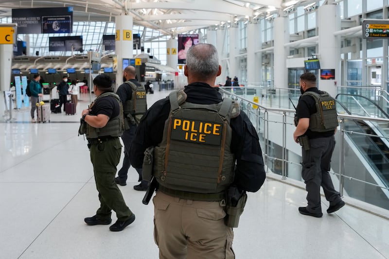 Immigration and Customs Enforcement (ICE) agents patrol at John F. Kennedy International Airport, New York City, U.S. March 23, 2026. Hundreds of Immigration and Customs Enforcement agents were ordered to deploy to airports to help fill TSA staffing gaps across the country.