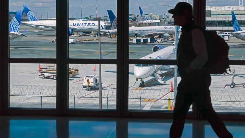 People move through Newark Liberty International Airport.