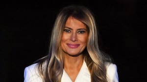 US First Lady Melania Trump smiles after lighting up the National Christmas Tree at the Ellipse in Washington, DC, on December 4, 2025.