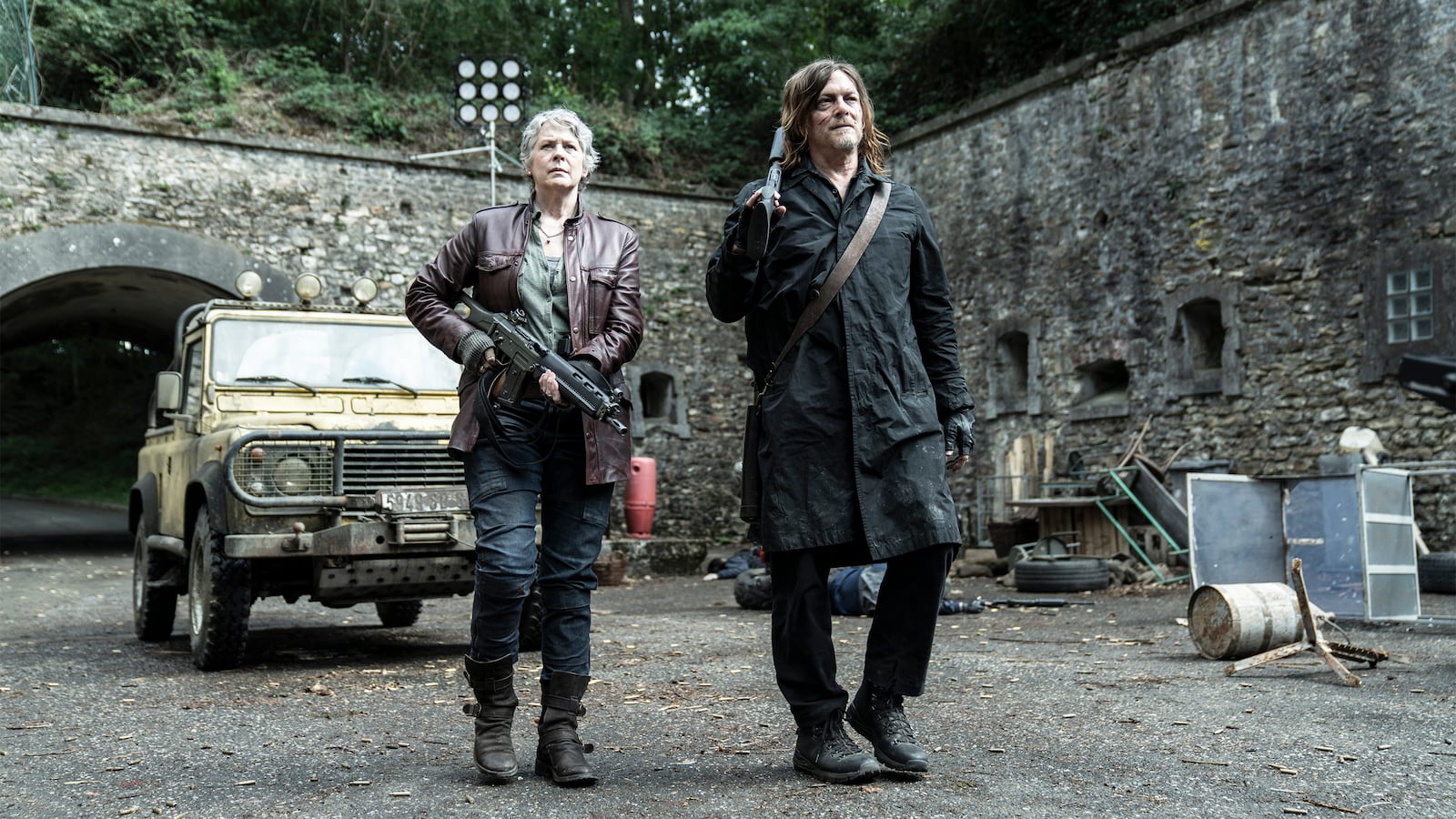 Norman Reedus as Daryl Dixon, Melissa McBride as Carol Peletier.