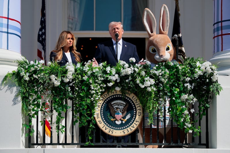 U.S. President Donald Trump, first lady Melania Trump and the Easter Bunny during the 2026 White House Easter Egg Roll at the White House in Washington, D.C., U.S., April 6, 2026. REUTERS/Evan Vucci