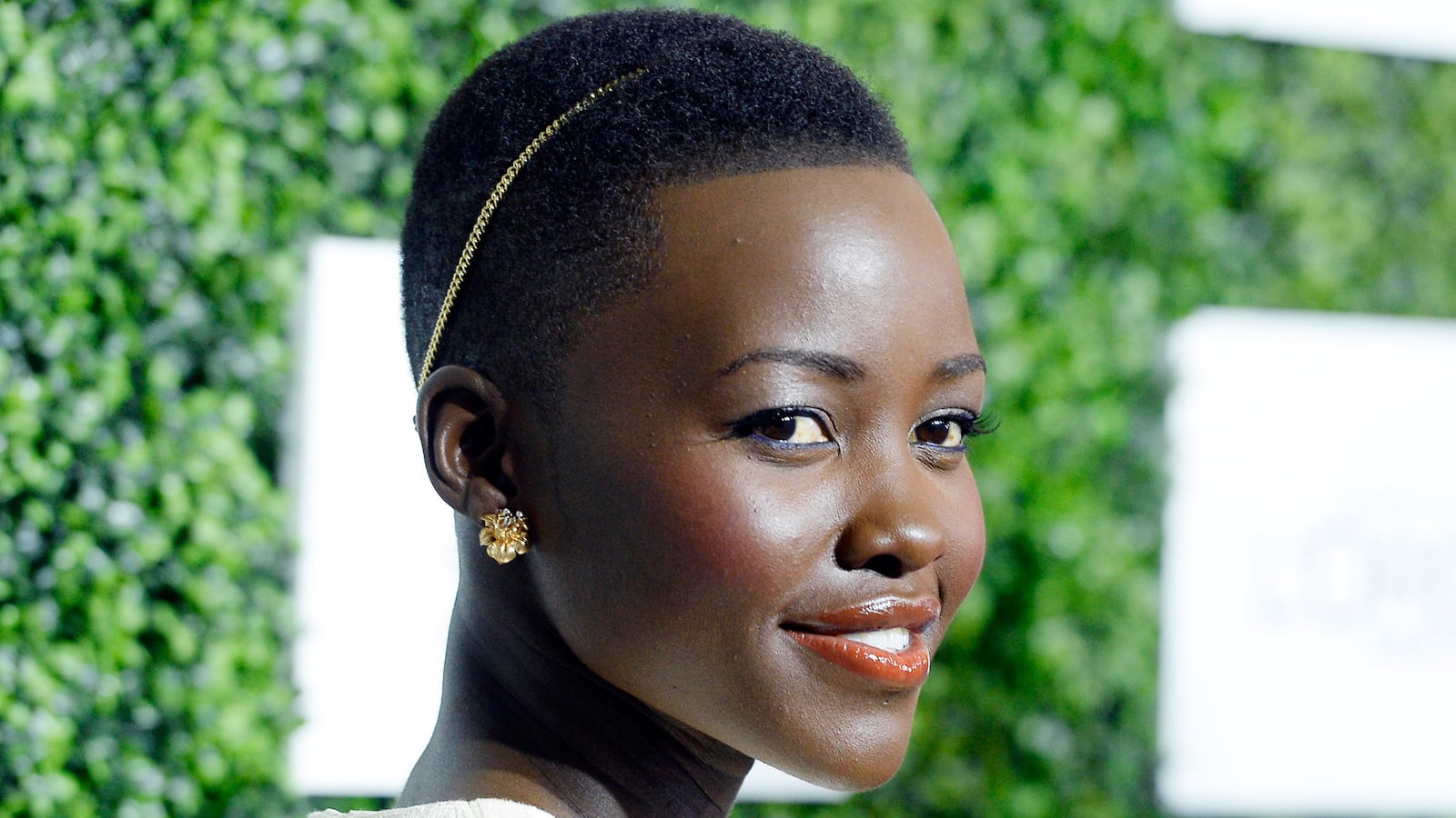 articles/2014/05/29/lupita-nyong-o-s-acceptable-blackness-and-the-myth-of-a-post-racial-hollywood/140527-rawiya-lupita-tease_dpa27t