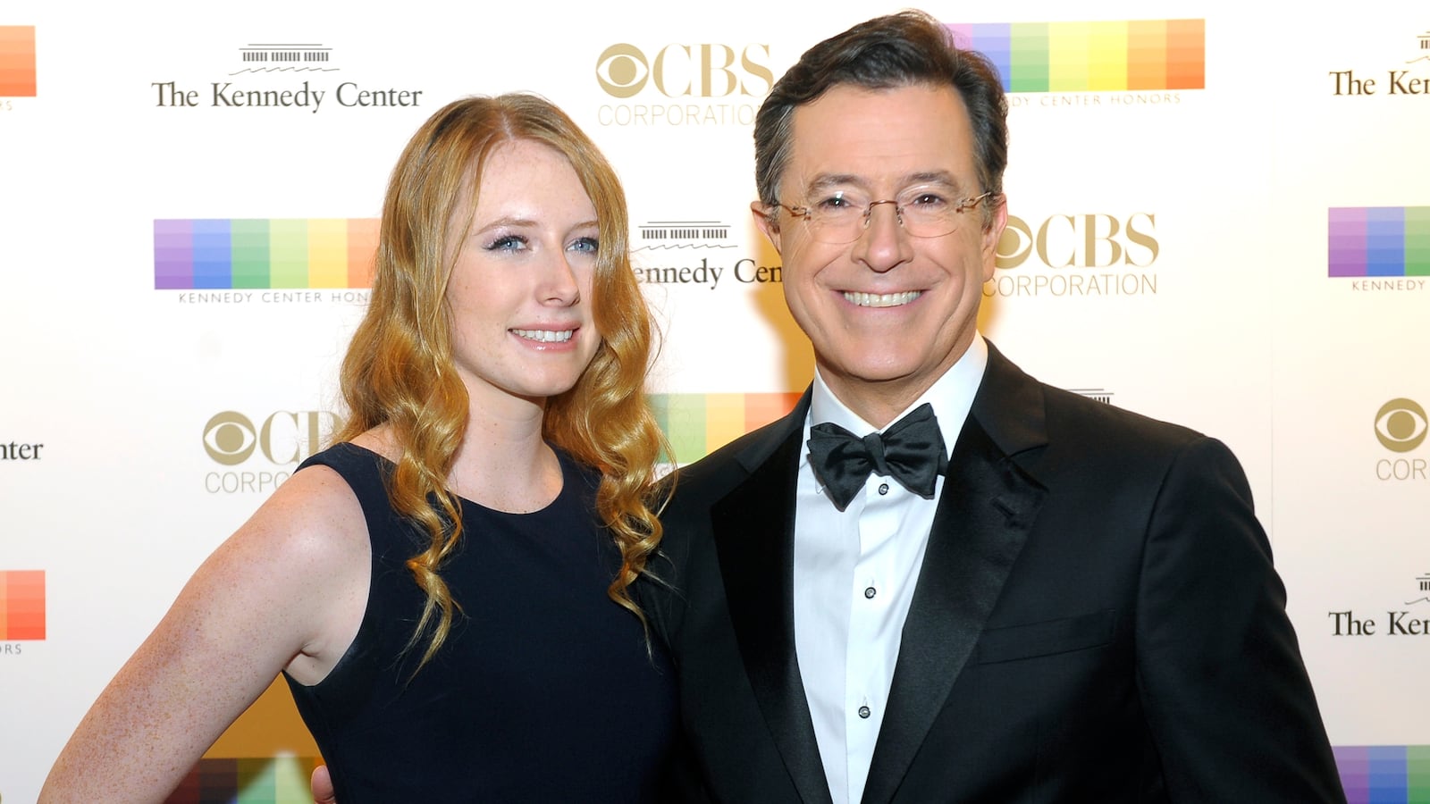 Stephen Colbert and his daughter, Madeleine, walk the red carpet before the Kennedy Center Honors December 06, 2015 in Washington, DC.