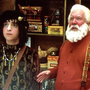 David Krumholtz, Tim Allen, Spencer Breslin stand next to each other in a still from ‘The Santa Clause 2’